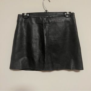 Black leather mini skirt